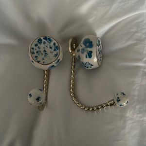 Two Anthropologie wall hooks